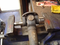  use something to push (old cam follower) and something to catch (old brake piston)